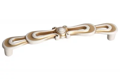 Ручка-скоба 128мм, отделка молочная с золотой патиной: WMN.791X.128.M00V7 Ручка-скоба 128мм, отделка молочная с золотой патиной: WMN.791X.128.M00V7